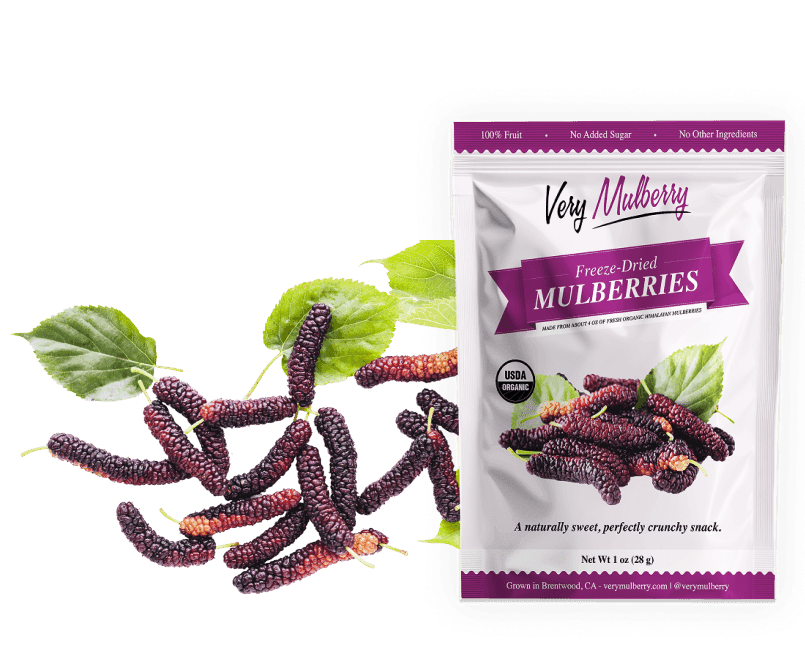Very Mulberry freeze-dried mulberries pouch beside a pile of fresh Himalayan mulberries and leaves, Brentwood, CA